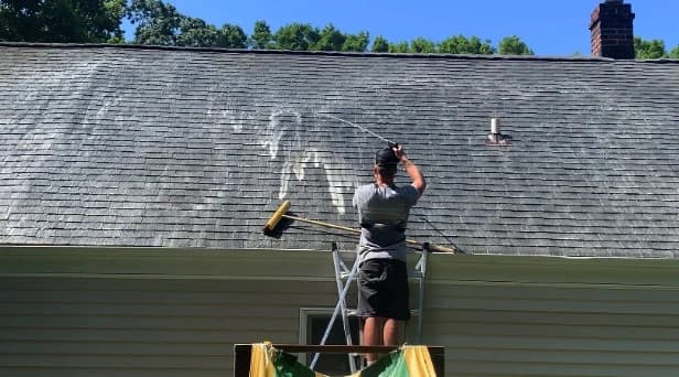 Before and after results of roof washing by New Franklin Power Washing in New Franklin